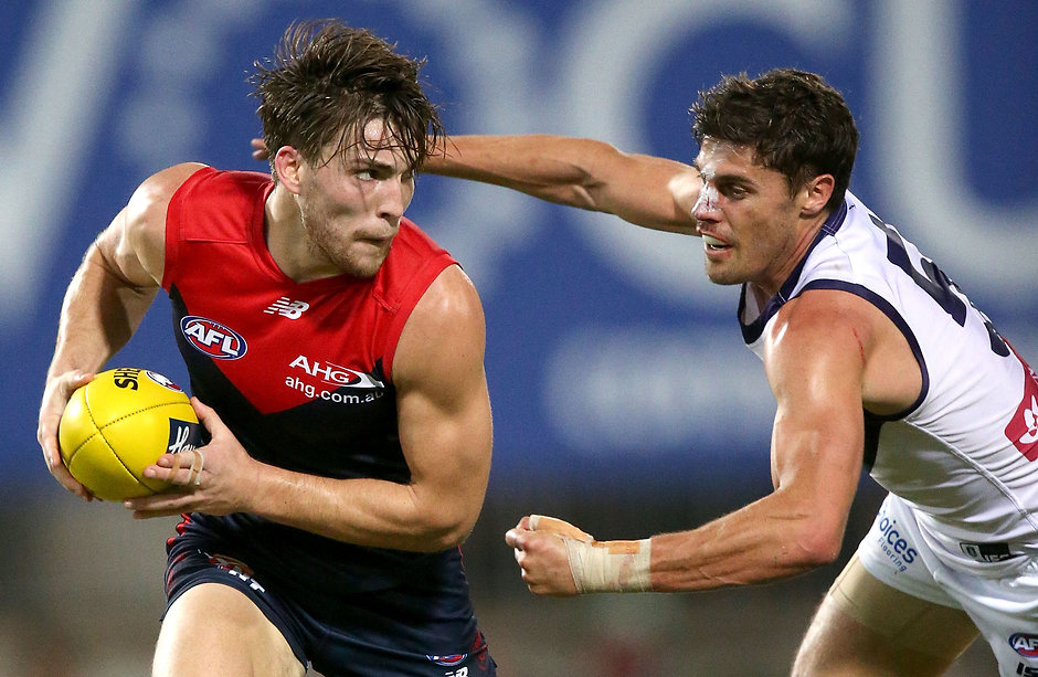 AFL 2016 Rd 16 - Melbourne v Fremantle DARWIN, AUSTRALIA - JULY 09: Jack Viney of the Demons evades Garrick Ibbotson of the Dockers during the 2016 AFL Round 16 match between the Melbourne Demons and the Fremantle Dockers at TIO Stadium on July 9, 2016 in Darwin, Australia. (Photo by Justine Walker/AFL Media)